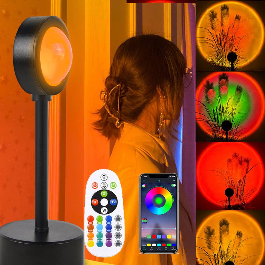 USB sunset projection lamp casting a warm golden-hour glow in a bedroom