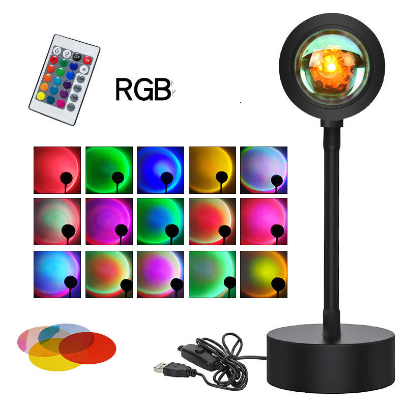 USB sunset projection lamp casting a warm golden-hour glow in a bedroom