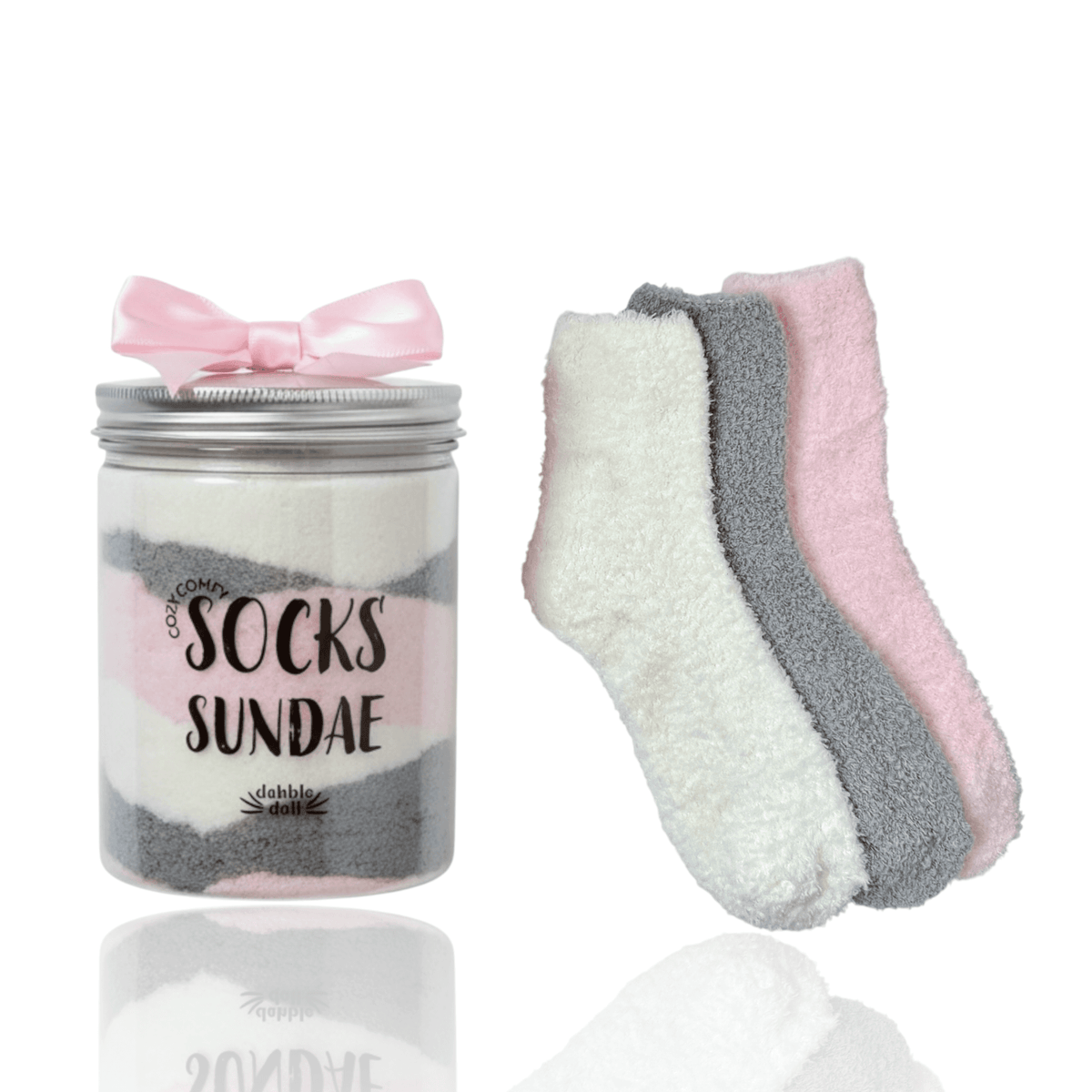 Three pairs of cozy socks in a sundae jar with a bow