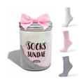 Three pairs of cozy socks in a sundae jar with a bow