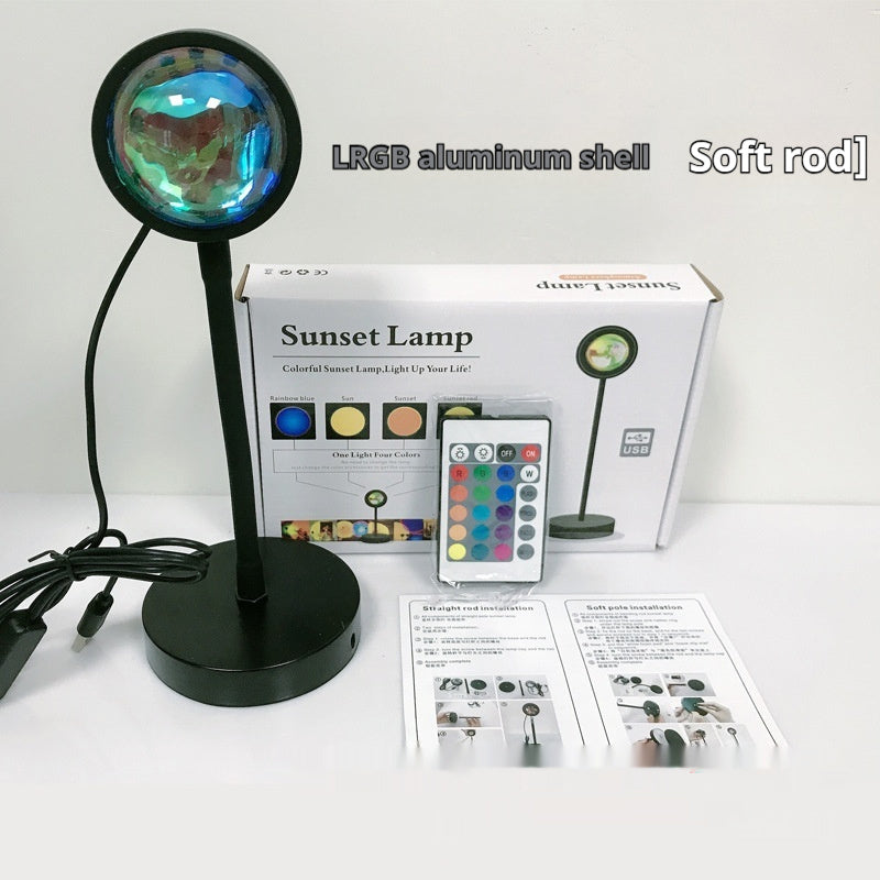 USB sunset projection lamp casting a warm golden-hour glow in a bedroom