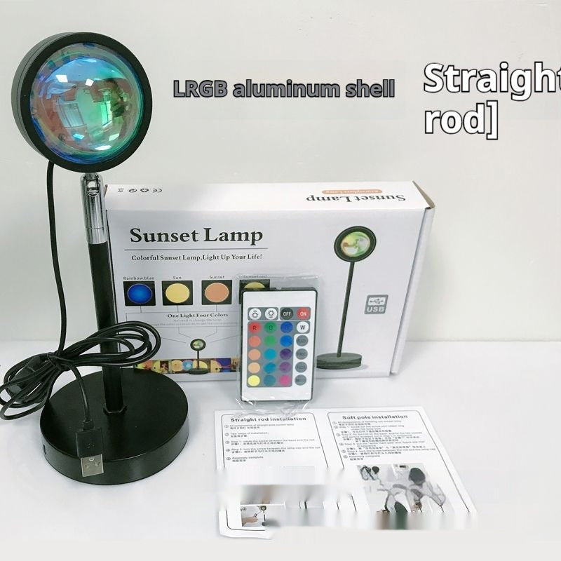 USB sunset projection lamp casting a warm golden-hour glow in a bedroom